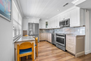 Spacious 3-Bedroom Condo with Stunning Lake, Garden, and Golf on Palm-Aire Country Club and Resort - The Oaks in Florida - for sale on GolfHomes.com, golf home, golf lot