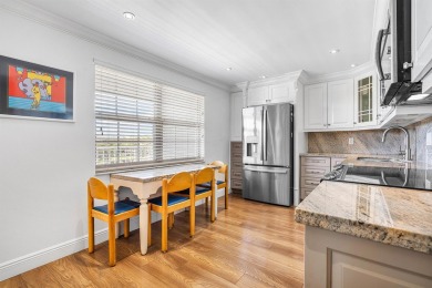 Spacious 3-Bedroom Condo with Stunning Lake, Garden, and Golf on Palm-Aire Country Club and Resort - The Oaks in Florida - for sale on GolfHomes.com, golf home, golf lot
