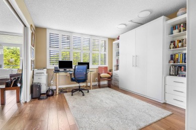 Spacious 3-Bedroom Condo with Stunning Lake, Garden, and Golf on Palm-Aire Country Club and Resort - The Oaks in Florida - for sale on GolfHomes.com, golf home, golf lot