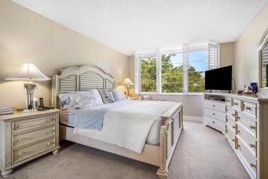 Spacious 3-Bedroom Condo with Stunning Lake, Garden, and Golf on Palm-Aire Country Club and Resort - The Oaks in Florida - for sale on GolfHomes.com, golf home, golf lot