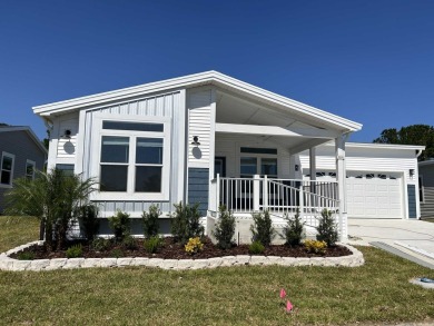 2 BEDROOM, 2 BATHROOM, PARLOR This New Palm Harbor Carriage on Scotland Yards Golf Club in Florida - for sale on GolfHomes.com, golf home, golf lot