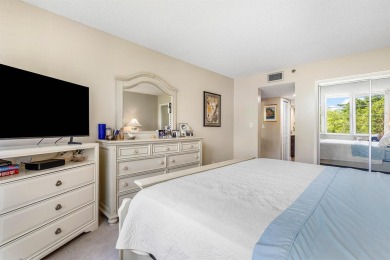 Spacious 3-Bedroom Condo with Stunning Lake, Garden, and Golf on Palm-Aire Country Club and Resort - The Oaks in Florida - for sale on GolfHomes.com, golf home, golf lot