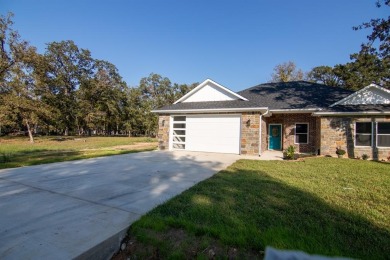 Welcome to your dream home in the sought-after golf & lake on Star Harbor Golf Club in Texas - for sale on GolfHomes.com, golf home, golf lot