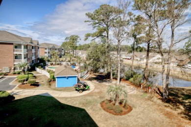 Located just steps to one of the community pools and grilling on Cypress Bay Golf Club in South Carolina - for sale on GolfHomes.com, golf home, golf lot
