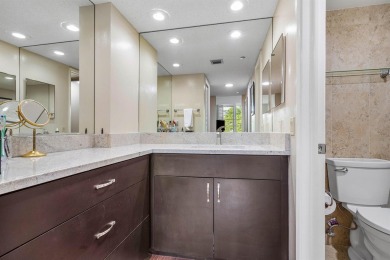Spacious 3-Bedroom Condo with Stunning Lake, Garden, and Golf on Palm-Aire Country Club and Resort - The Oaks in Florida - for sale on GolfHomes.com, golf home, golf lot