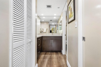 Spacious 3-Bedroom Condo with Stunning Lake, Garden, and Golf on Palm-Aire Country Club and Resort - The Oaks in Florida - for sale on GolfHomes.com, golf home, golf lot