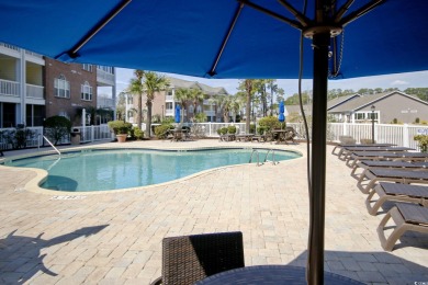 Located just steps to one of the community pools and grilling on Cypress Bay Golf Club in South Carolina - for sale on GolfHomes.com, golf home, golf lot