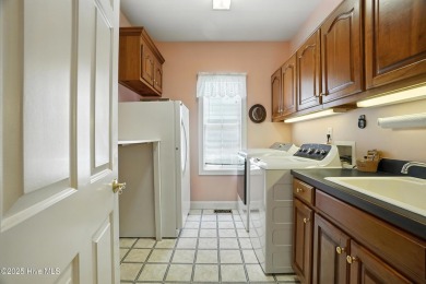 Experience the best of waterfront and golf course living at 107 on Sound Golf Links at Albemarle Plantation in North Carolina - for sale on GolfHomes.com, golf home, golf lot