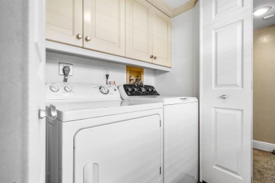 Spacious 3-Bedroom Condo with Stunning Lake, Garden, and Golf on Palm-Aire Country Club and Resort - The Oaks in Florida - for sale on GolfHomes.com, golf home, golf lot