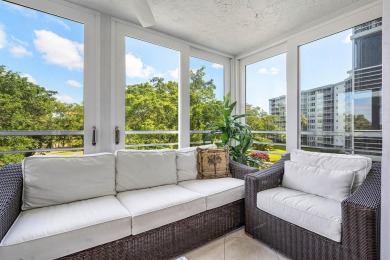 Spacious 3-Bedroom Condo with Stunning Lake, Garden, and Golf on Palm-Aire Country Club and Resort - The Oaks in Florida - for sale on GolfHomes.com, golf home, golf lot