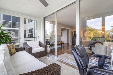 Spacious 3-Bedroom Condo with Stunning Lake, Garden, and Golf on Palm-Aire Country Club and Resort - The Oaks in Florida - for sale on GolfHomes.com, golf home, golf lot