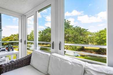 Spacious 3-Bedroom Condo with Stunning Lake, Garden, and Golf on Palm-Aire Country Club and Resort - The Oaks in Florida - for sale on GolfHomes.com, golf home, golf lot