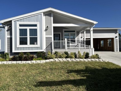 2 BEDROOM, 2 BATHROOM, PARLOR This New Palm Harbor Carriage on Scotland Yards Golf Club in Florida - for sale on GolfHomes.com, golf home, golf lot