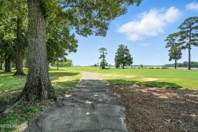 Experience the best of waterfront and golf course living at 107 on Sound Golf Links at Albemarle Plantation in North Carolina - for sale on GolfHomes.com, golf home, golf lot