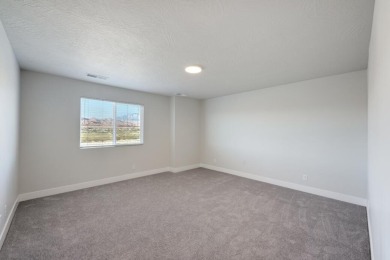 Welcome to the Sunburst, a beautifully crafted 2-story townhome on Coral Canyon Golf Course in Utah - for sale on GolfHomes.com, golf home, golf lot