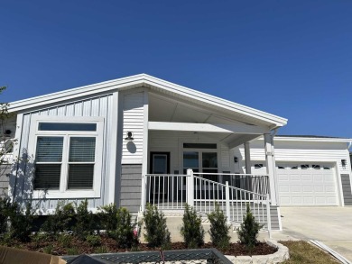 2 BEDROOM, 2 BATHROOM, PARLOR This New Palm Harbor Carriage on Scotland Yards Golf Club in Florida - for sale on GolfHomes.com, golf home, golf lot