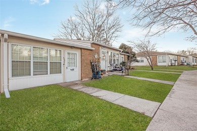 Enjoy low maintenance living in this bright and updated one on Leisure Village Golf Course in New York - for sale on GolfHomes.com, golf home, golf lot