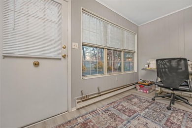 Enjoy low maintenance living in this bright and updated one on Leisure Village Golf Course in New York - for sale on GolfHomes.com, golf home, golf lot