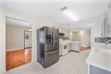 Beautiful Golf home in SANDPIPER GOLF AND COUNTRY CLUB!! 55+ on Sandpiper Golf Club in Florida - for sale on GolfHomes.com, golf home, golf lot