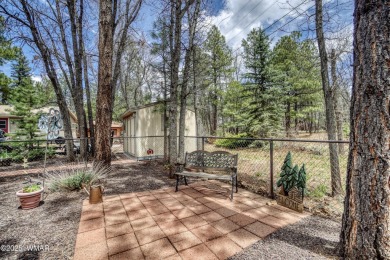 Discover your perfect mountain escape in this immaculate and on Pinetop Lakes Golf and Country Club in Arizona - for sale on GolfHomes.com, golf home, golf lot