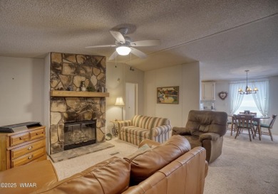Discover your perfect mountain escape in this immaculate and on Pinetop Lakes Golf and Country Club in Arizona - for sale on GolfHomes.com, golf home, golf lot