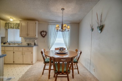 Discover your perfect mountain escape in this immaculate and on Pinetop Lakes Golf and Country Club in Arizona - for sale on GolfHomes.com, golf home, golf lot