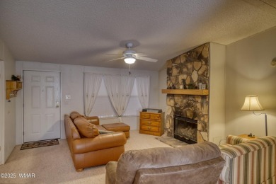 Discover your perfect mountain escape in this immaculate and on Pinetop Lakes Golf and Country Club in Arizona - for sale on GolfHomes.com, golf home, golf lot