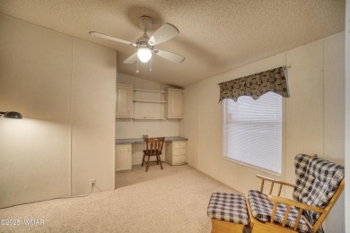 Discover your perfect mountain escape in this immaculate and on Pinetop Lakes Golf and Country Club in Arizona - for sale on GolfHomes.com, golf home, golf lot