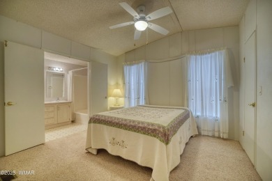 Discover your perfect mountain escape in this immaculate and on Pinetop Lakes Golf and Country Club in Arizona - for sale on GolfHomes.com, golf home, golf lot
