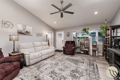 This wonderful home sits just moments from Lake Hills Golf on Lake Hills Golf Course in Montana - for sale on GolfHomes.com, golf home, golf lot