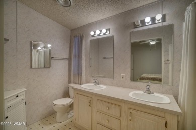 Discover your perfect mountain escape in this immaculate and on Pinetop Lakes Golf and Country Club in Arizona - for sale on GolfHomes.com, golf home, golf lot