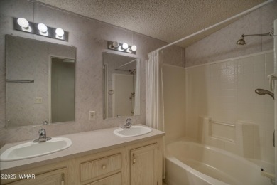 Discover your perfect mountain escape in this immaculate and on Pinetop Lakes Golf and Country Club in Arizona - for sale on GolfHomes.com, golf home, golf lot