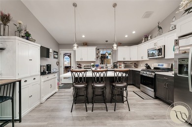 This wonderful home sits just moments from Lake Hills Golf on Lake Hills Golf Course in Montana - for sale on GolfHomes.com, golf home, golf lot