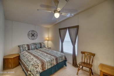Discover your perfect mountain escape in this immaculate and on Pinetop Lakes Golf and Country Club in Arizona - for sale on GolfHomes.com, golf home, golf lot