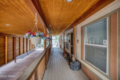 Discover your perfect mountain escape in this immaculate and on Pinetop Lakes Golf and Country Club in Arizona - for sale on GolfHomes.com, golf home, golf lot
