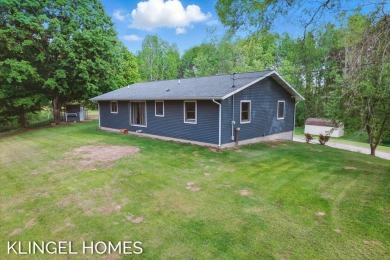 Welcome to 5204 S 68th Ave, New Era! This beautiful ranch style on Grand View Golf Course in Michigan - for sale on GolfHomes.com, golf home, golf lot