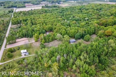 Welcome to 5204 S 68th Ave, New Era! This beautiful ranch style on Grand View Golf Course in Michigan - for sale on GolfHomes.com, golf home, golf lot