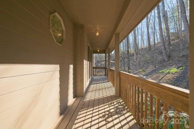 Beautiful home nestled in the woods is this well built custom on Linville Falls Golf Club in North Carolina - for sale on GolfHomes.com, golf home, golf lot
