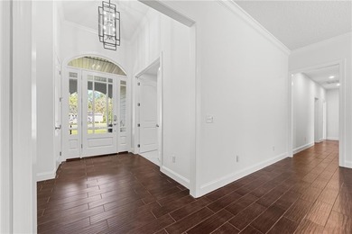 Nestled in the gated community of Osprey Cove, 402 The Strand on The Club At Osprey Cove in Georgia - for sale on GolfHomes.com, golf home, golf lot