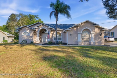 Welcome to your private Florida retreat in the heart of Spring on Oak Hills Country Club in Florida - for sale on GolfHomes.com, golf home, golf lot
