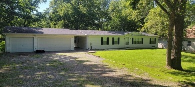Love the peaceful lakeside living and exciting recreational on Linn Valley Lakes - Deer Trace Golf Course in Kansas - for sale on GolfHomes.com, golf home, golf lot