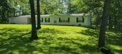Love the peaceful lakeside living and exciting recreational on Linn Valley Lakes - Deer Trace Golf Course in Kansas - for sale on GolfHomes.com, golf home, golf lot