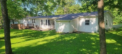 Love the peaceful lakeside living and exciting recreational on Linn Valley Lakes - Deer Trace Golf Course in Kansas - for sale on GolfHomes.com, golf home, golf lot