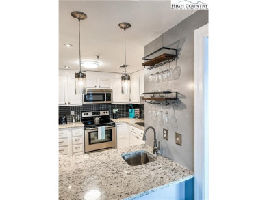 Amazing long range views, ski slope views and a fully furnished on Sugar Mountain Golf Course in North Carolina - for sale on GolfHomes.com, golf home, golf lot