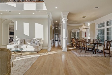 Luxury home with striking European architecture overlooking the on RidgePointe Country Club in Arkansas - for sale on GolfHomes.com, golf home, golf lot