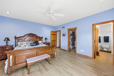 Lake life is calling--and this one answers in style! This on Raintree Country Club in Missouri - for sale on GolfHomes.com, golf home, golf lot