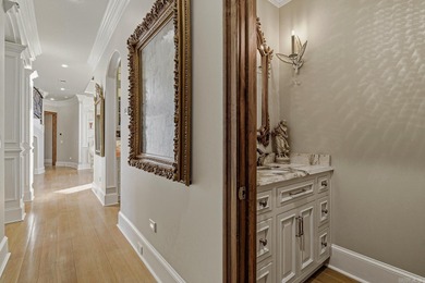 Luxury home with striking European architecture overlooking the on RidgePointe Country Club in Arkansas - for sale on GolfHomes.com, golf home, golf lot