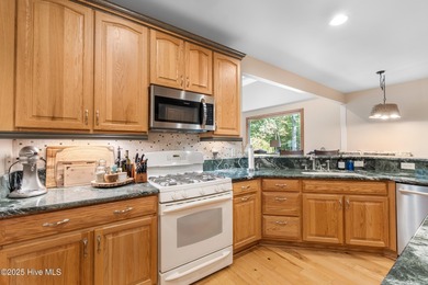 This beautifully maintained brick ranch is ready for its next on Sound Golf Links at Albemarle Plantation in North Carolina - for sale on GolfHomes.com, golf home, golf lot