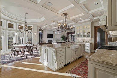 Luxury home with striking European architecture overlooking the on RidgePointe Country Club in Arkansas - for sale on GolfHomes.com, golf home, golf lot
