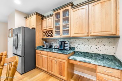 This beautifully maintained brick ranch is ready for its next on Sound Golf Links at Albemarle Plantation in North Carolina - for sale on GolfHomes.com, golf home, golf lot